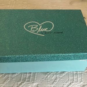 Betsy Johnson blue soled, ivory lace, peep toed shoes.